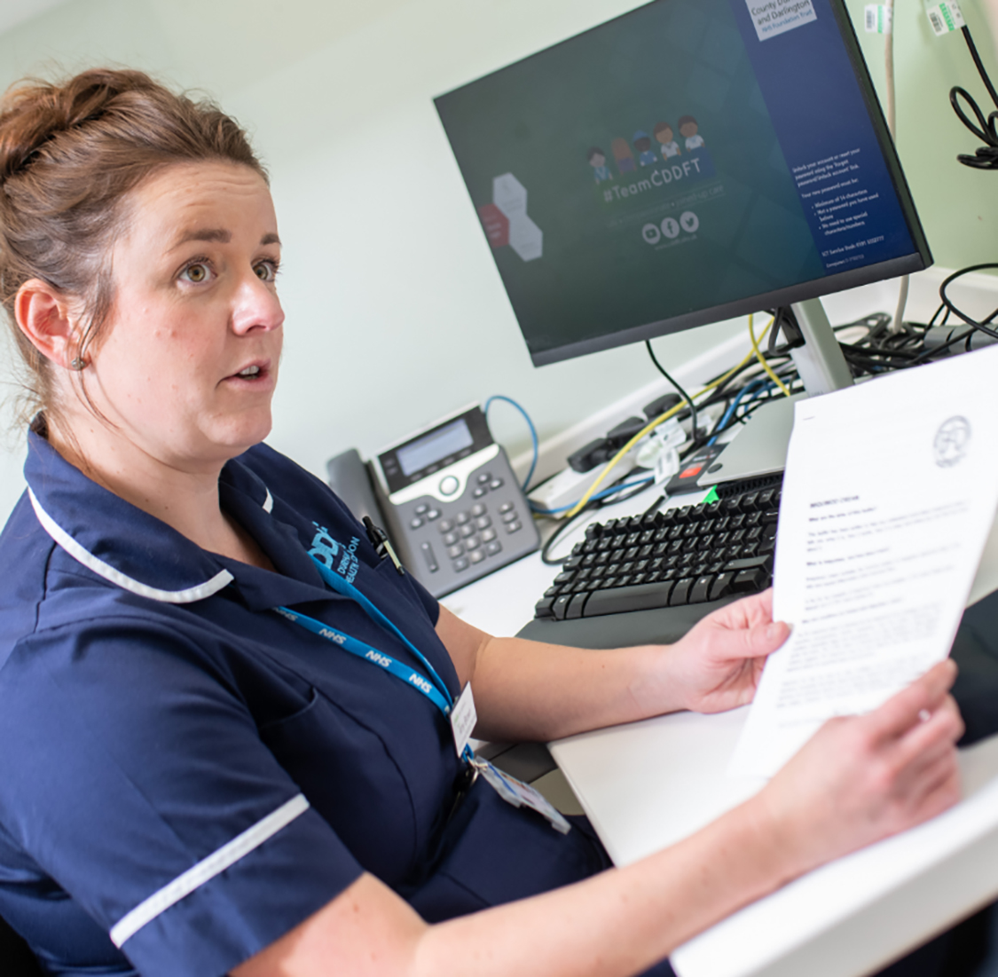 same day urgent care nurse practitioner talking to patient